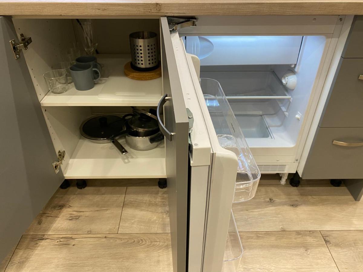 Aparthotel Riga Kültér fotó A refrigerator with a built-in ice maker