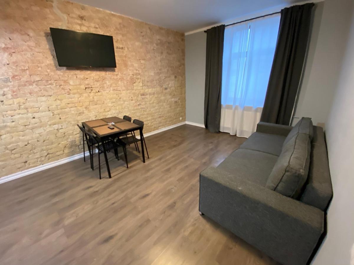 Aparthotel Riga Kültér fotó A living room in a typical apartment