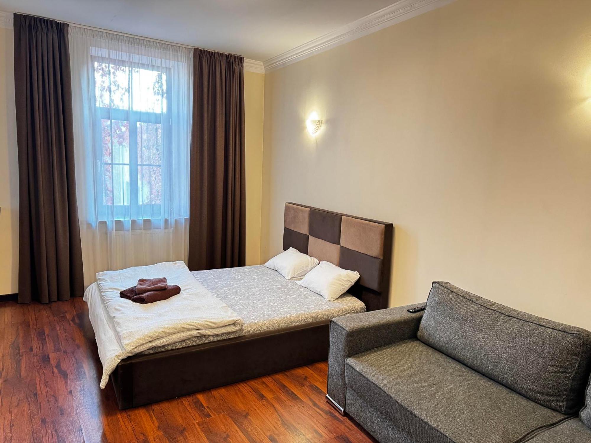 Aparthotel Riga Kültér fotó A bedroom in a hotel