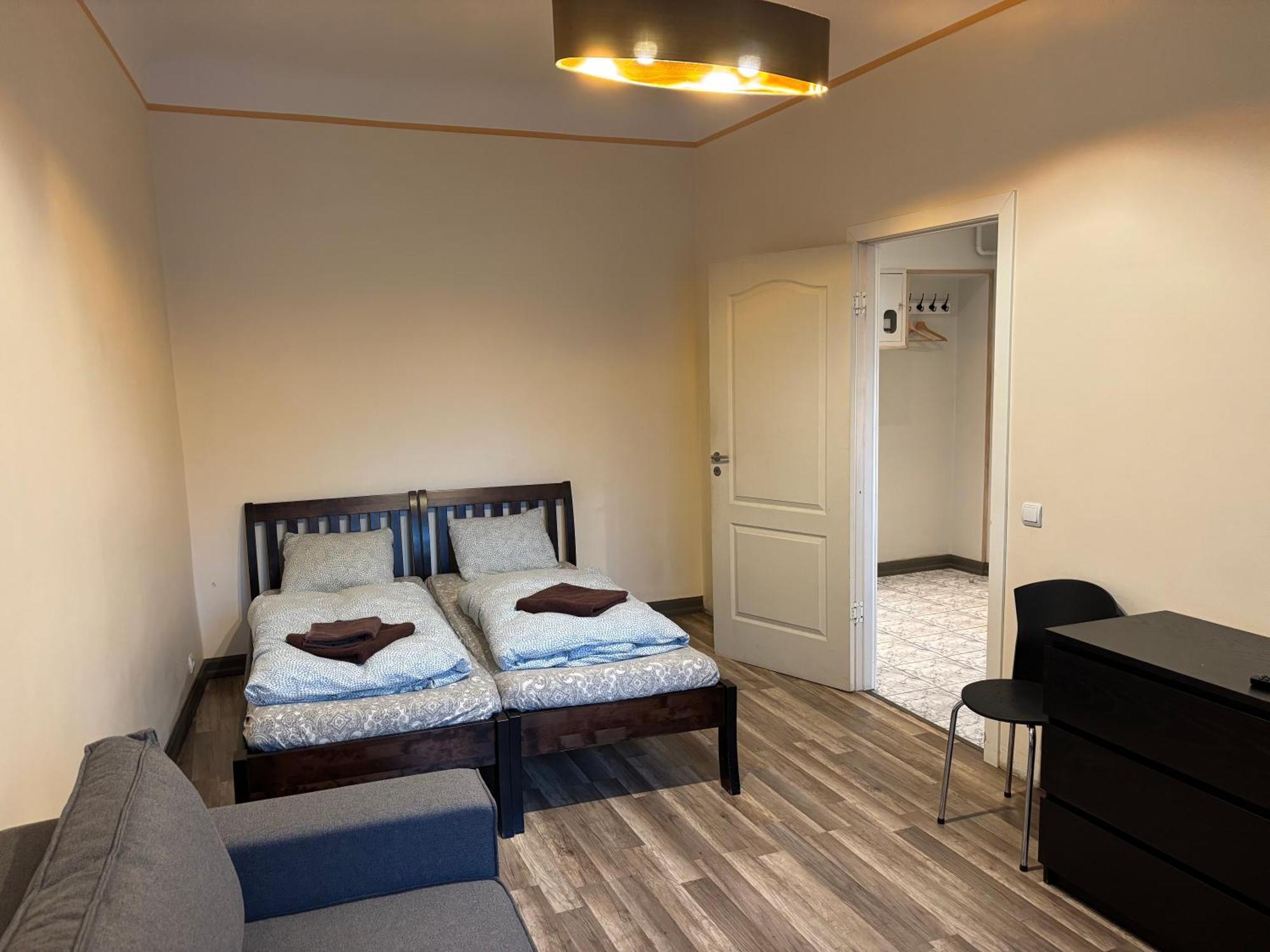 Aparthotel Riga Kültér fotó A room at the hostel
