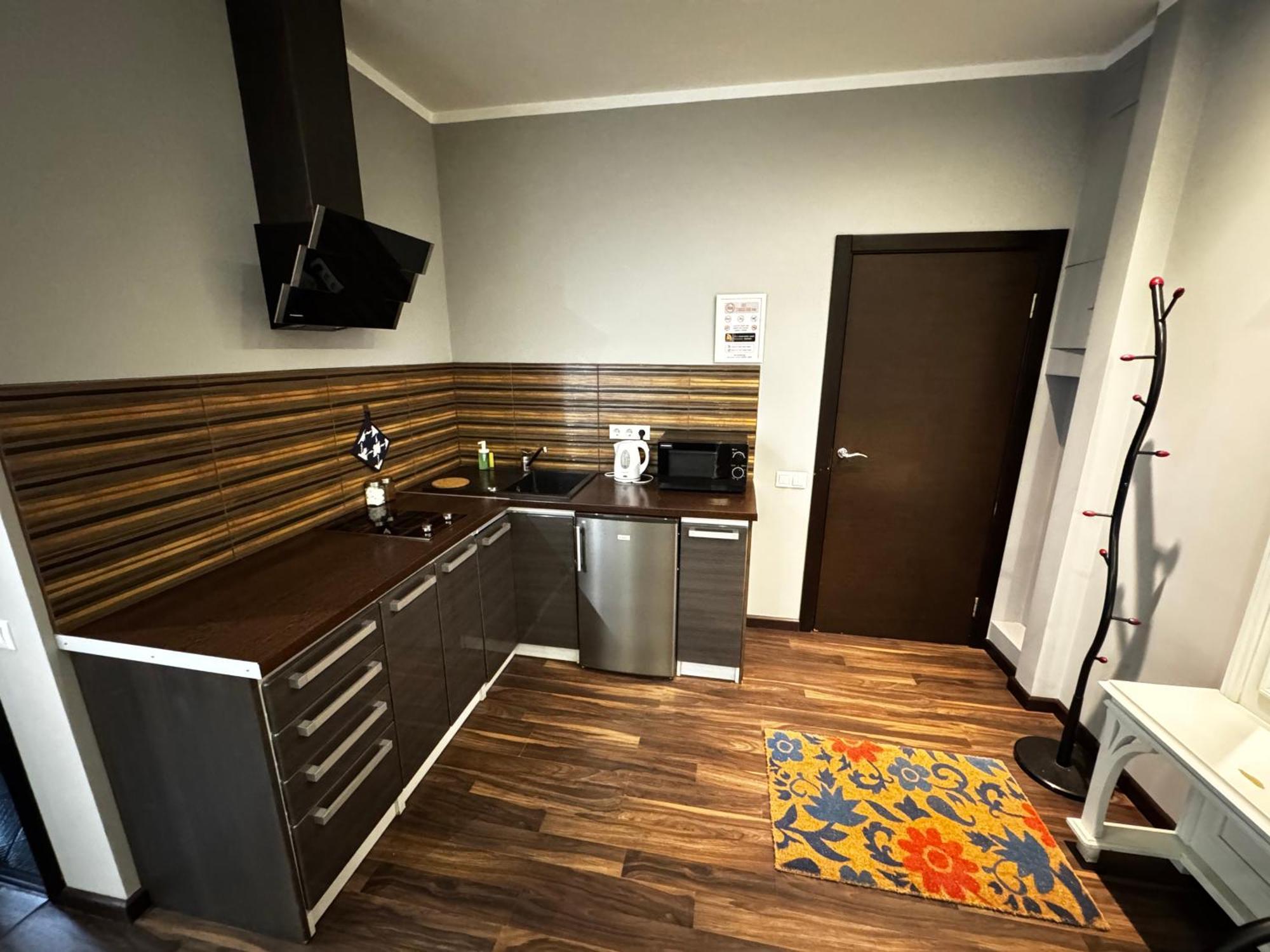 Aparthotel Riga Kültér fotó A typical kitchen in a typical apartment