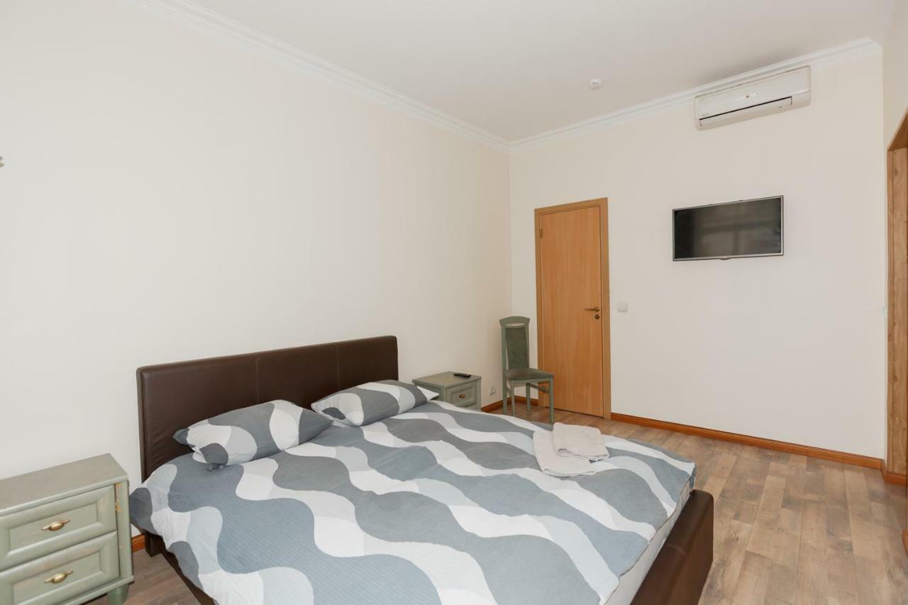 Aparthotel Riga Kültér fotó A bedroom in a hotel